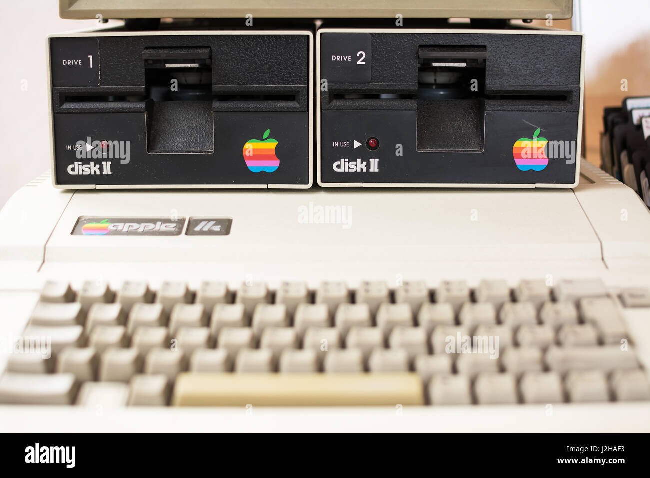 Keyboard (blurred) and disk drive  of Aged Apple computer Stock Photo