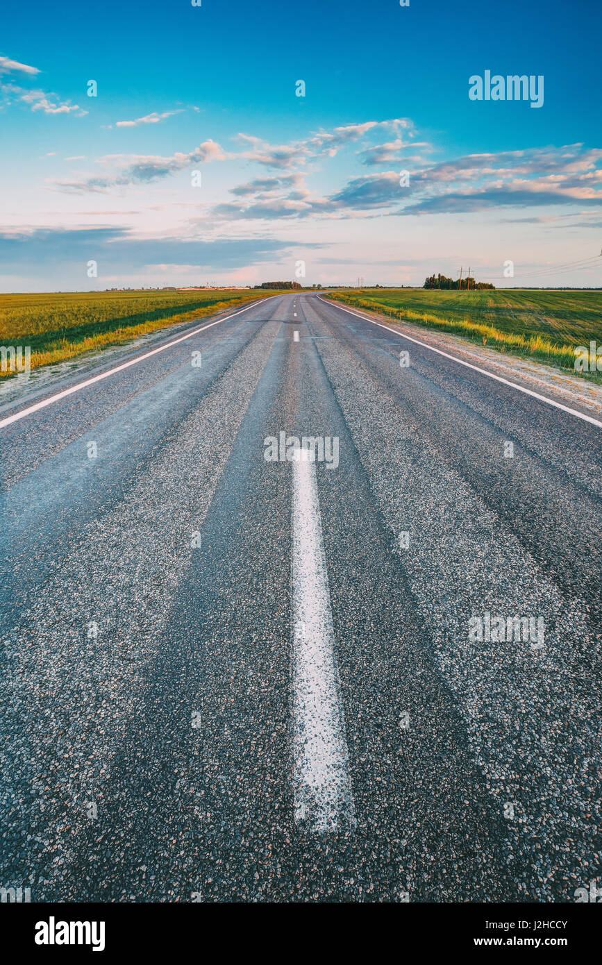 Curved Asphalt Country Open Road Through Spring Fields And Meadows In ...