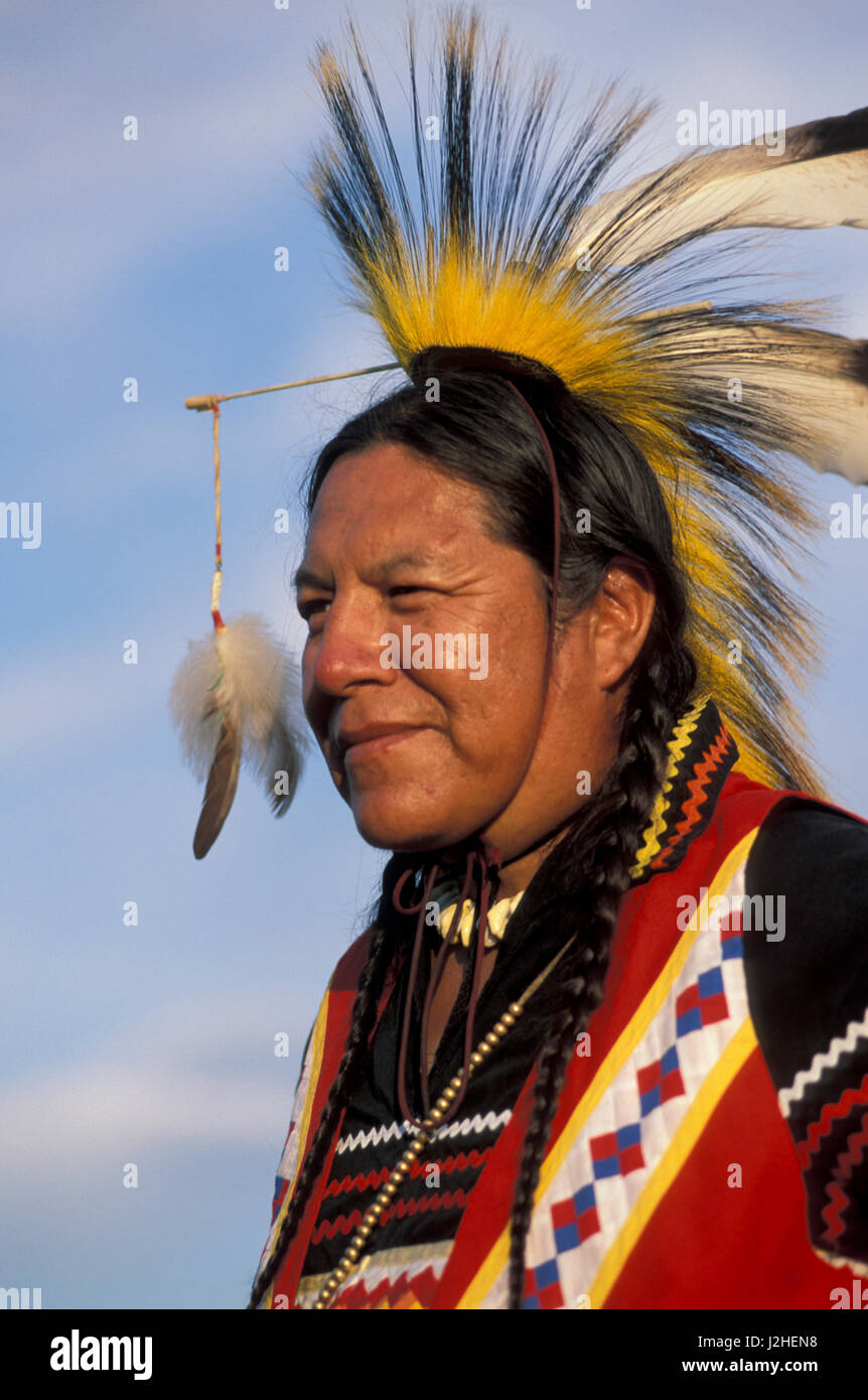 Closeup of Blackfeet tribal member dressed in traditional men's pow