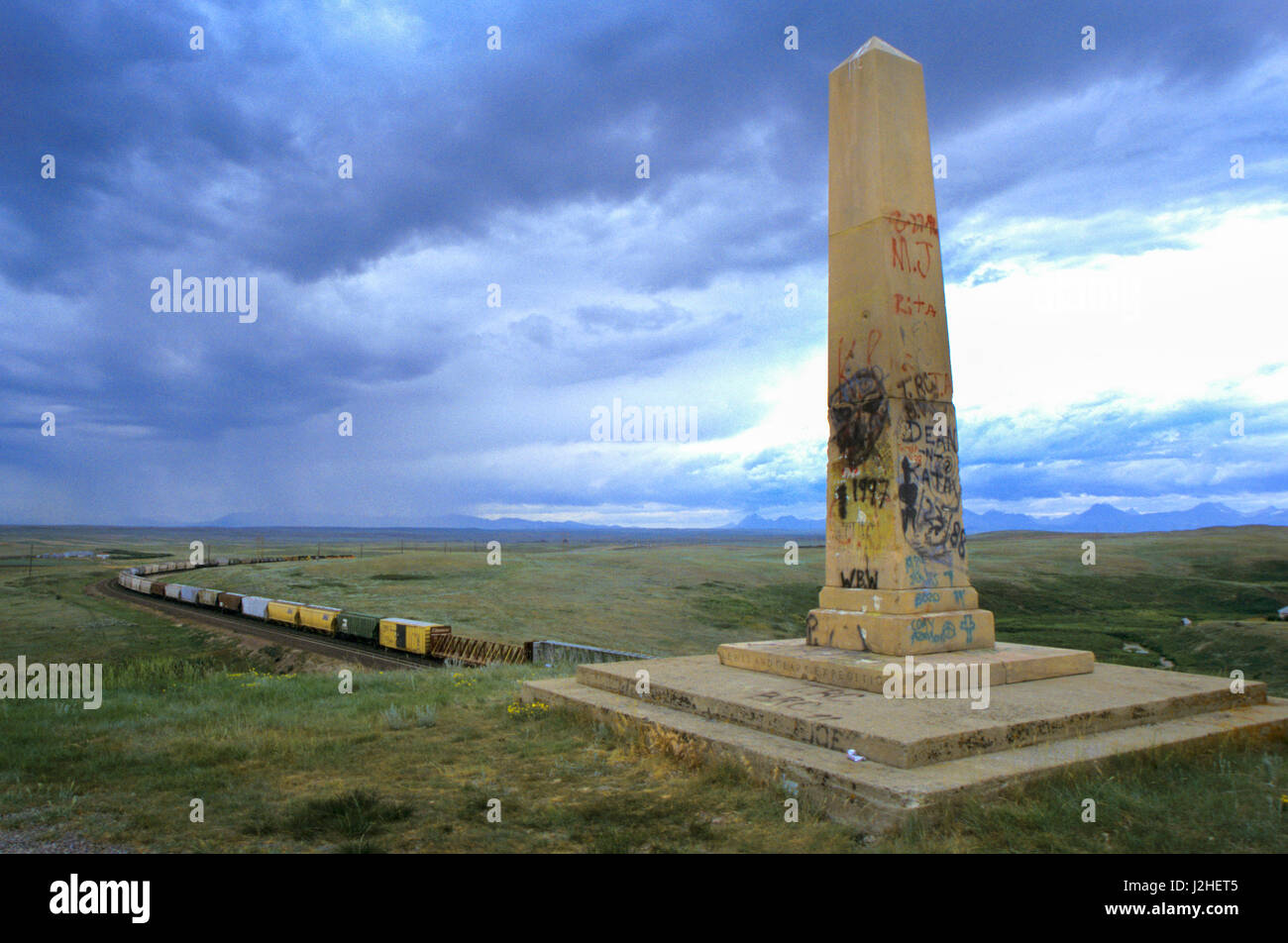 Union Pacific Lewis and Clark monument on Blackfeet Reservation in Browning Montana overlooks train and tracks Stock Photo