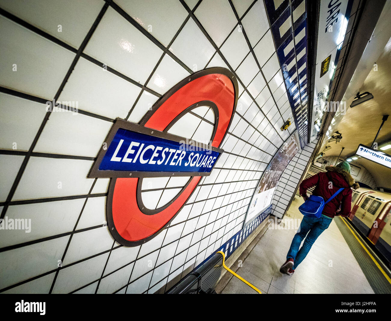 Leicester Square tube station logo on station wall, London, UK. Stock Photo
