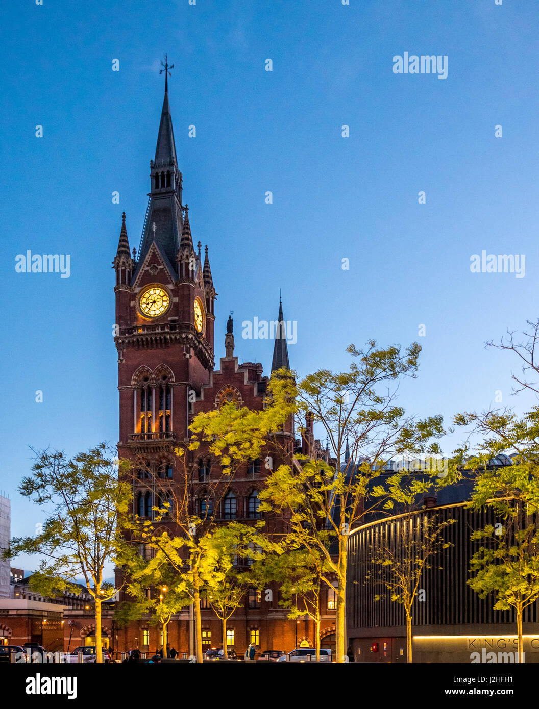 St Pancras train station clocktower at dusk, London, UK. Stock Photo