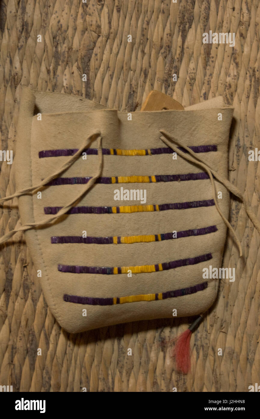Porcupine quillwork sewn onto buck skin bag that would be typically used for storing personal items by the Mandan, Hidatsa and Arikara on display at the Knife River Indian Village Museum, North Dakota Stock Photo