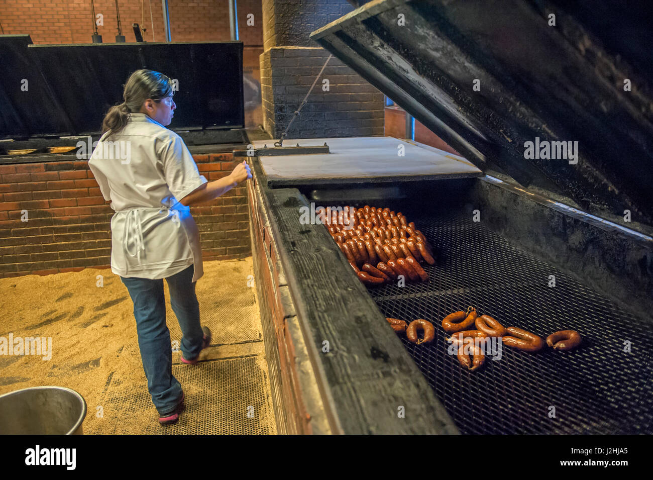 Sausage grilling, Kreuz Market, Lockhart, Texas, Usa (Editorial Use