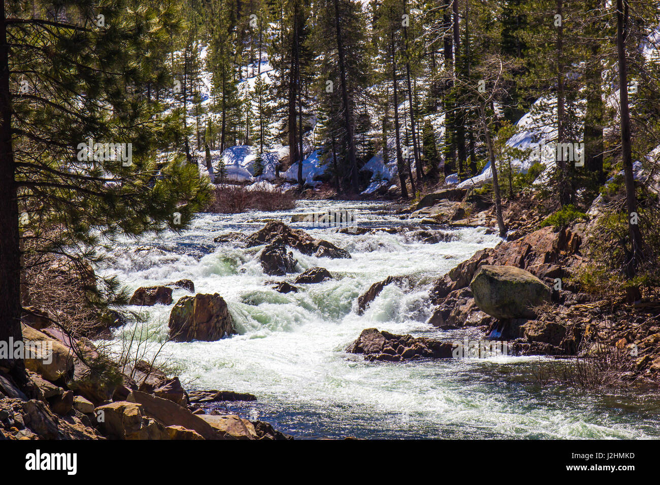 River Flowing From Snow Melt In Mountains Stock Photo Alamy