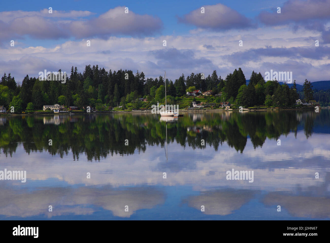 Tracyton, Washington State. Dyes Inlet landscape reflection on water