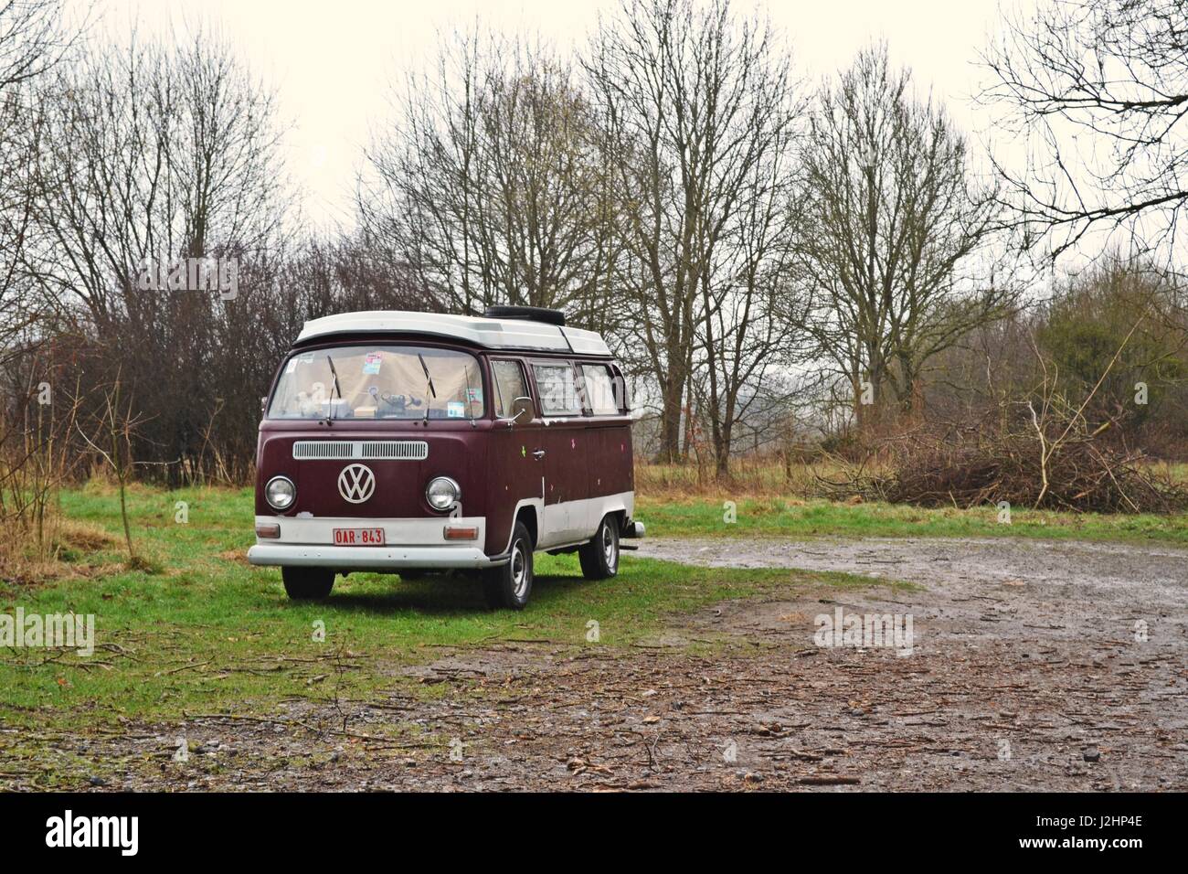 A Volkswagen Camper resting in somewhere between Citadelle de Dinant and Givet, in the forest region of the Ardennes. Stock Photo
