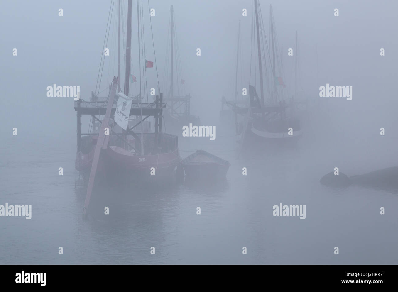 Rabelo boats, port wine boats with mist, Rio Douro, Porto, Portugal, Europe Stock Photo