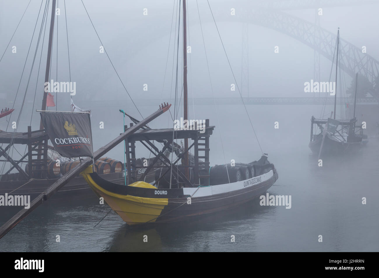 Rabelo boats, port wine boats with mist, Rio Douro, Porto, Portugal, Europe Stock Photo