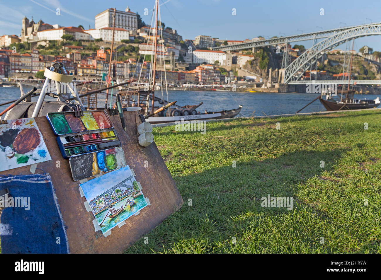 Painter in front of Rabelo boats, port wine boats on the Rio Douro, Douro River, Porto, Portugal, Germany Stock Photo