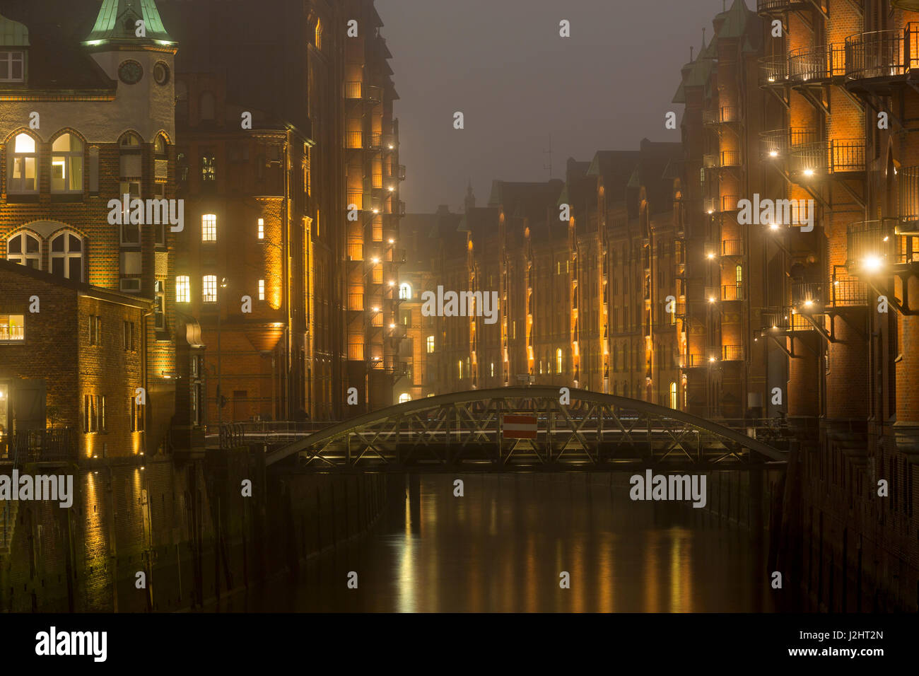 Historic Speicherstadt warehouse district at night, Hafencity, Hamburg, Germany, Europe Stock Photo