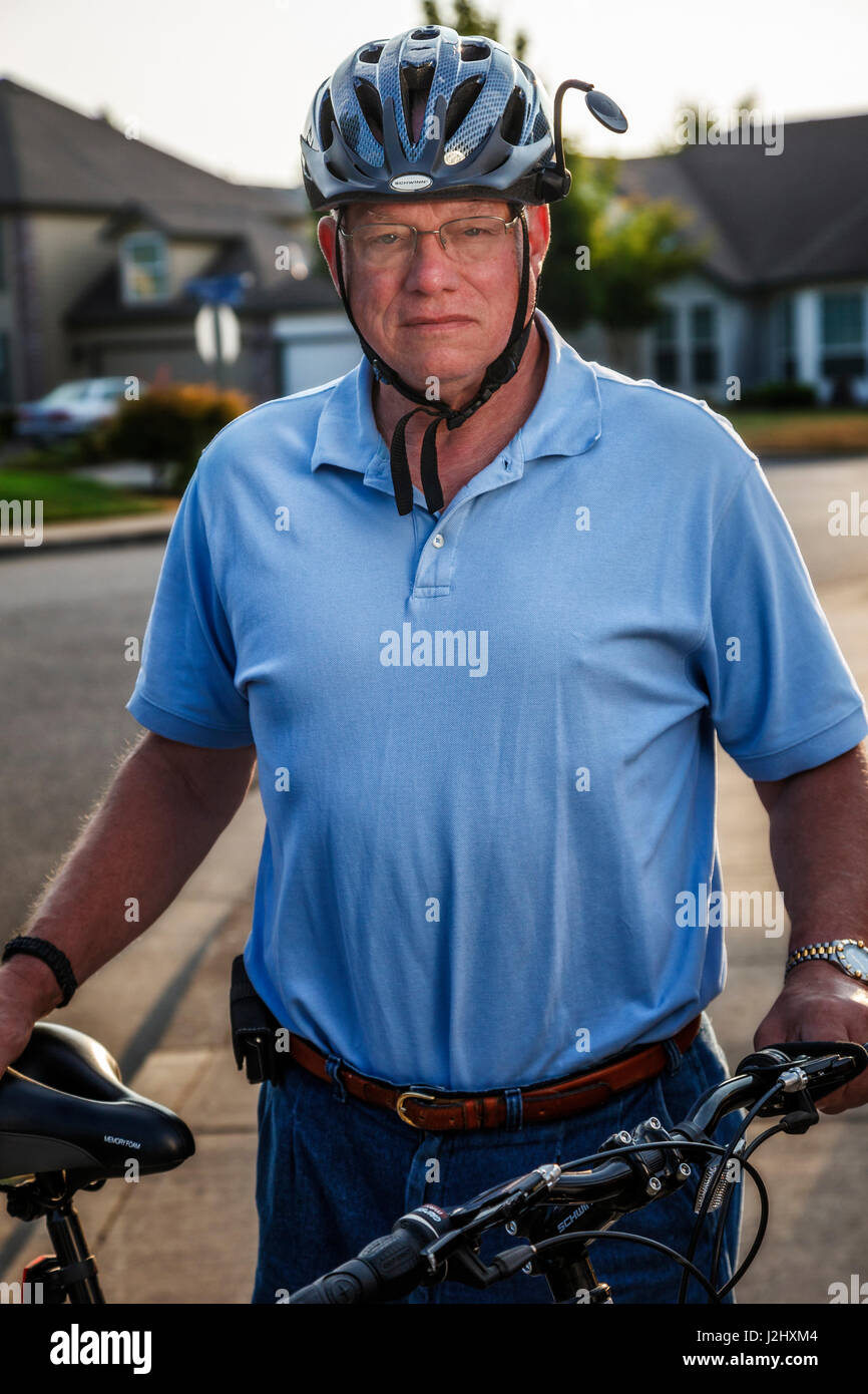 USA, Oregon, Keizer, man and his bike. (MR Stock Photo Alamy