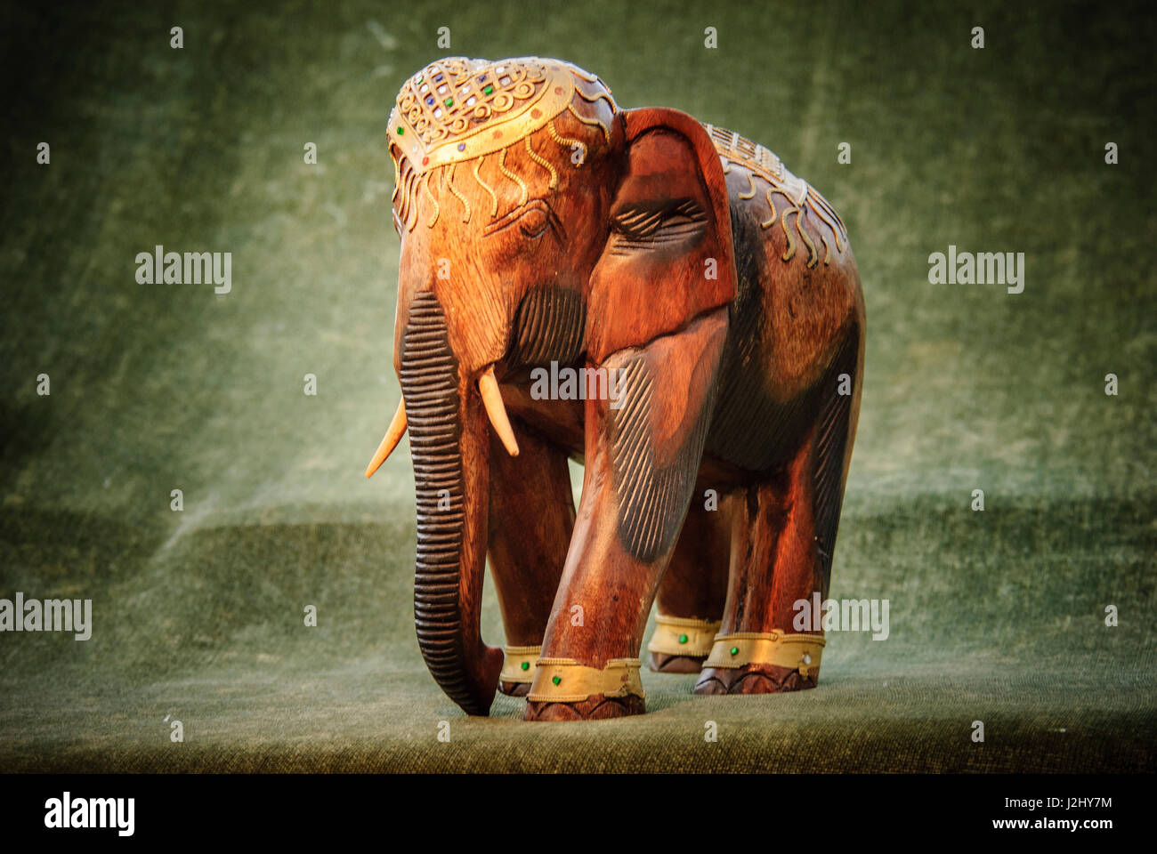 Carved wooden elephant hires stock photography and images Alamy