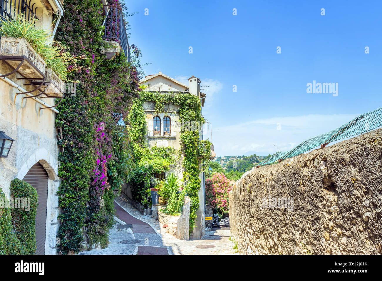 Vine covered homes along ancient street in St. Paul de Vence, Provence
