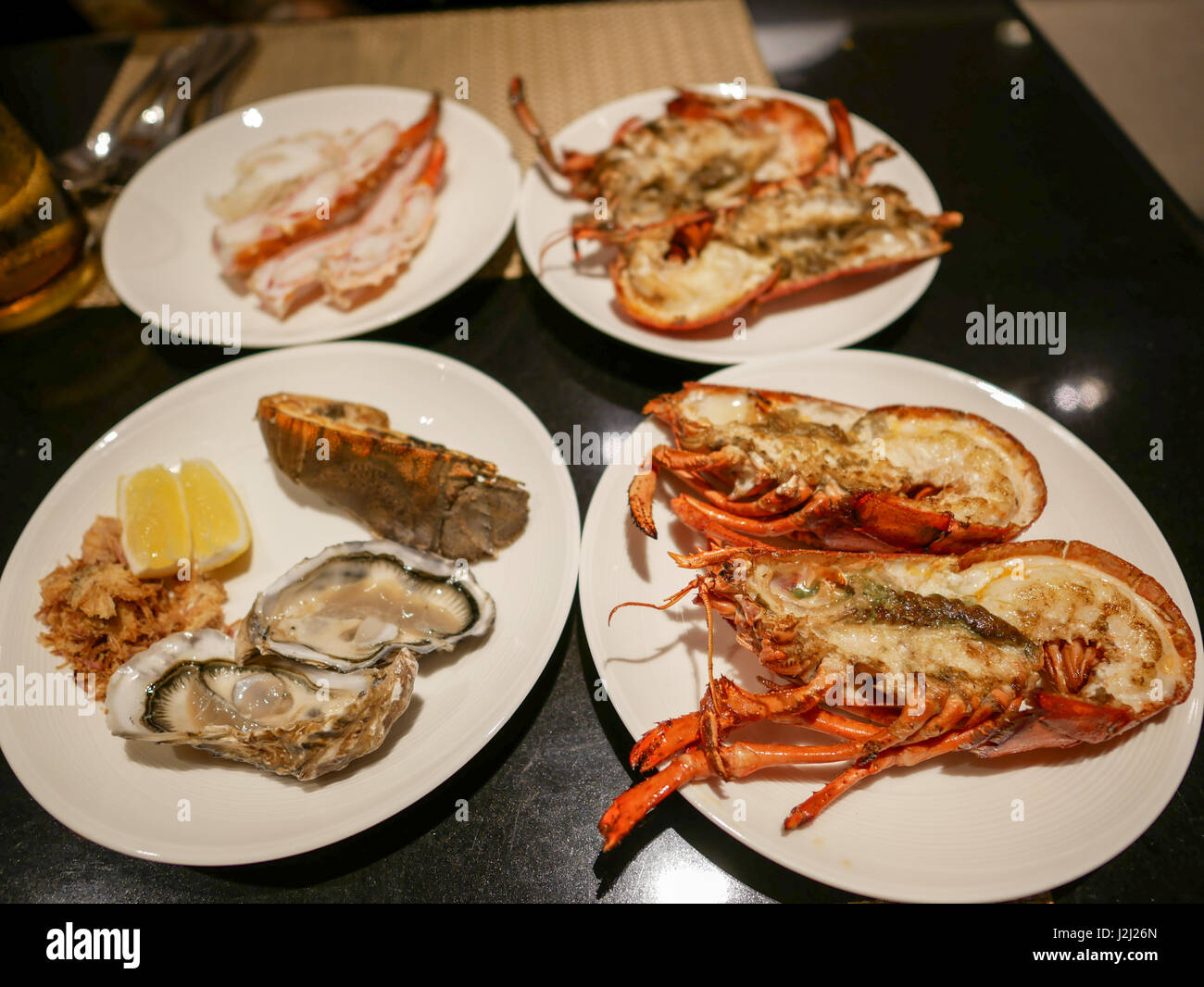 Giant grilled river prawns, Rock Lobster, Oysters, and Crab legs on the