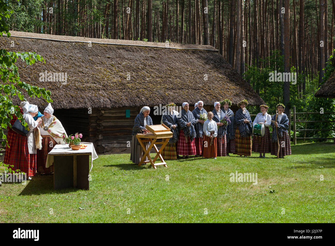 RIGA, LATVIA - 12 JUN 2016: Women group walking in national Latvian