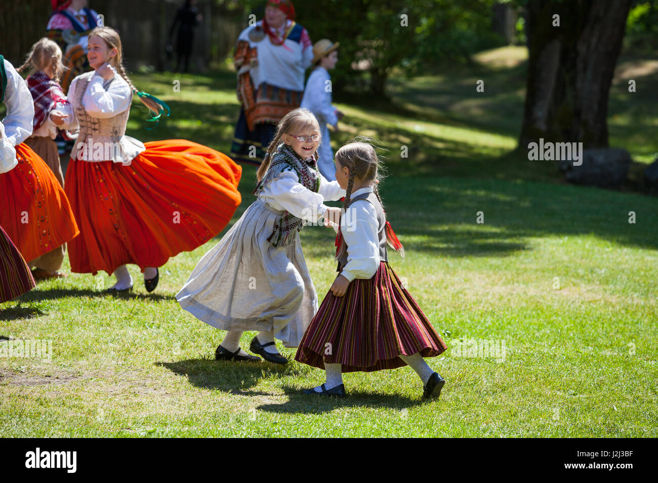 Intercultural Riga Events RIGA, LATVIA - 12 JUN 2016: Latvian dancers - small girls in national ...