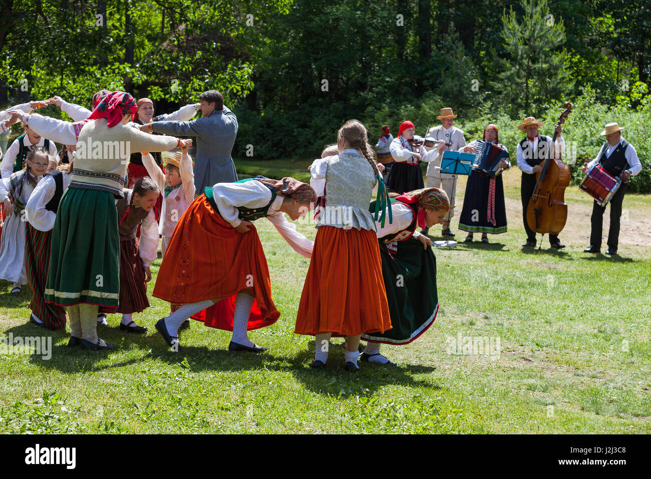 Intercultural Riga Events RIGA, LATVIA - 12 JUN 2016: Latvian dancers in national costumes ...