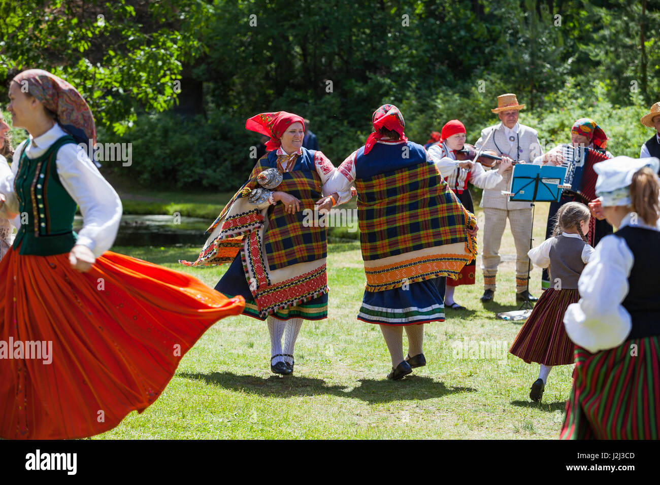 RIGA, LATVIA - 12 JUN 2016: Latvian dancers in national costumes