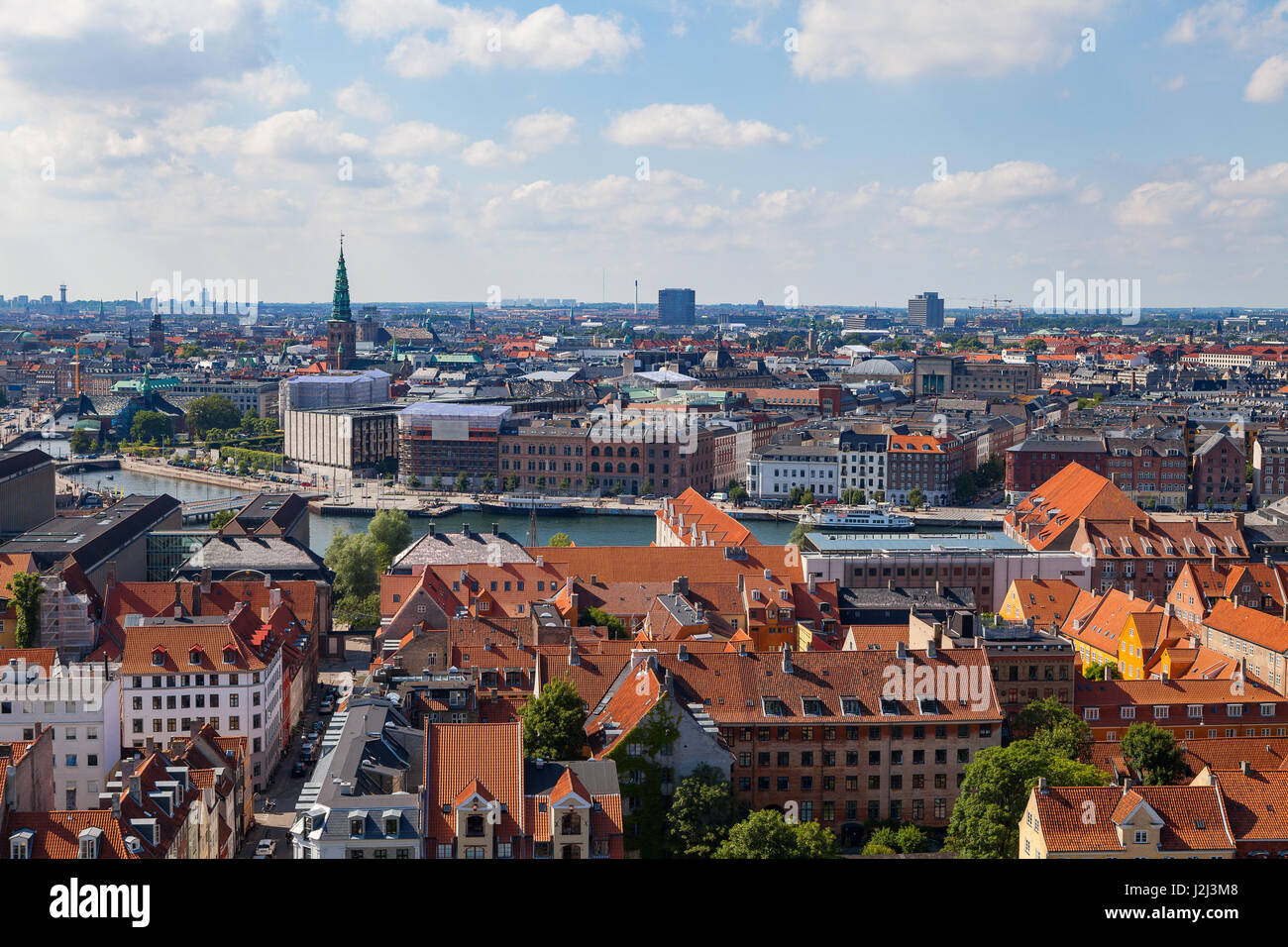 Aerial view of Copenhagen red roofs and canal. Christianshavn and ...