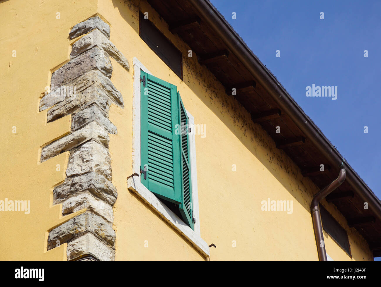 Brick building with stone corner in Rome Stock Photo
