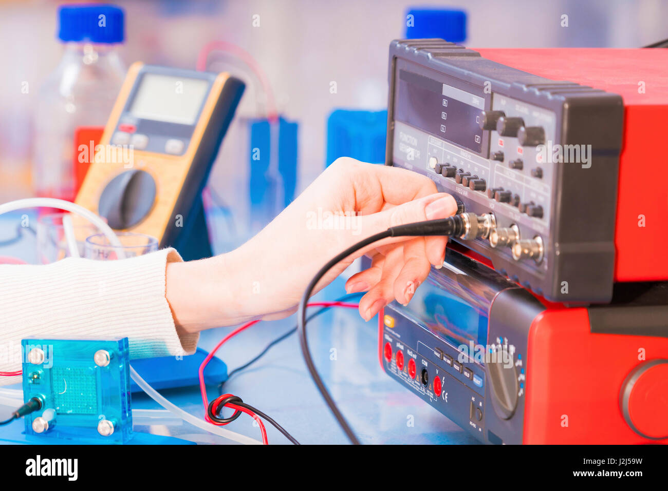 Scientist with hydrogen fuel cell in laboratory Stock Photo Alamy