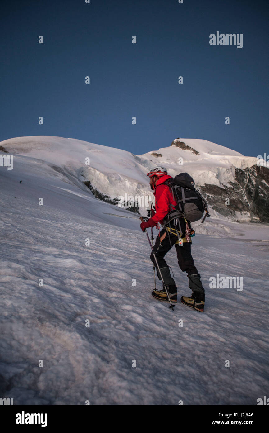Mountaineer while climbing the summit, Allalinhorn, mountain landscape, Switzerland, Saas Fee, series Britanniahütte, mountain range, ice, snow, cold, 1 person, trekking, adventure Stock Photo