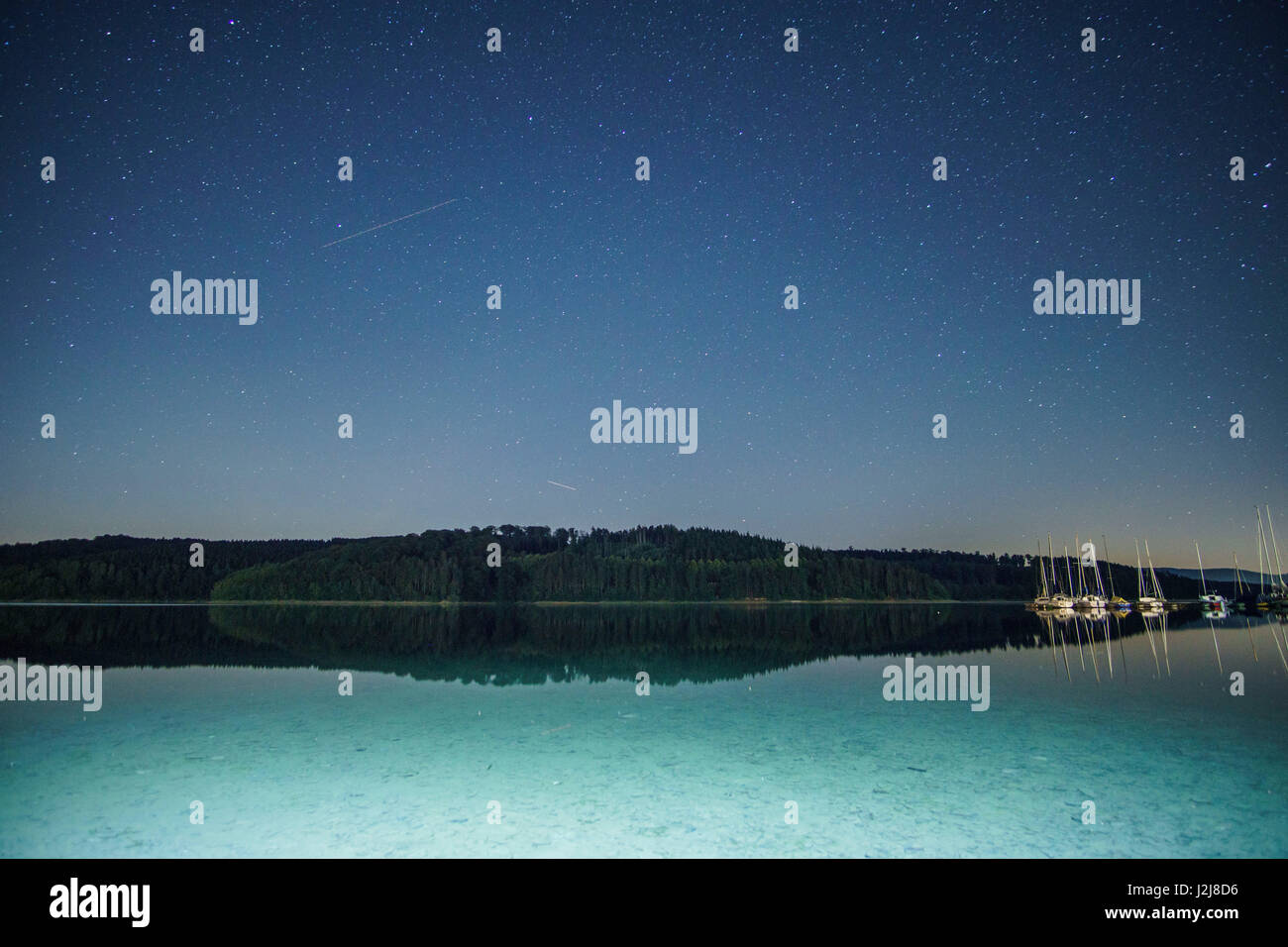 starry sky over the lake Stock Photo - Alamy