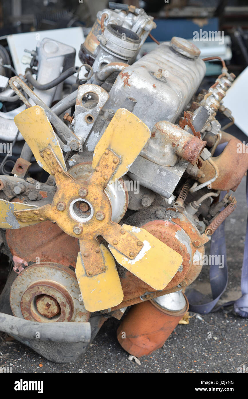 Old rusted engine ready for dismantling process Stock Photo