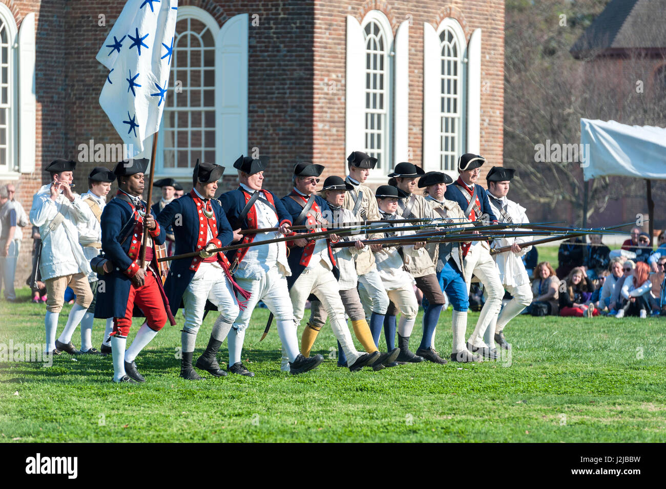 Revolutionary war reenactment at colonial williamsburg hires stock