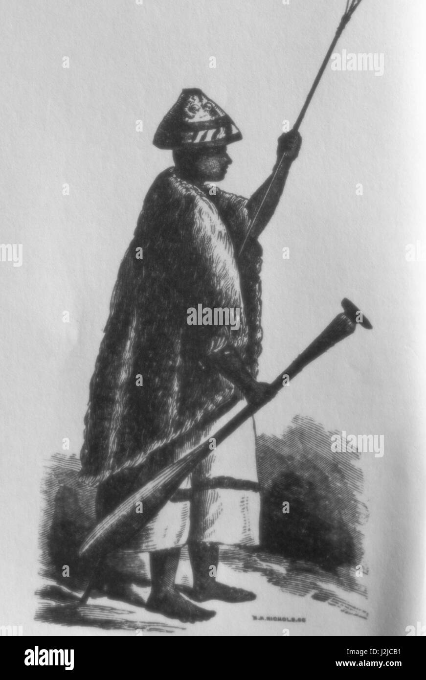 Historic drawing of a Chinook man wearing a conical cedar hat and woven cedar cape holds a canoe paddle (also used as a salmon club) and harpoon. Stock Photo