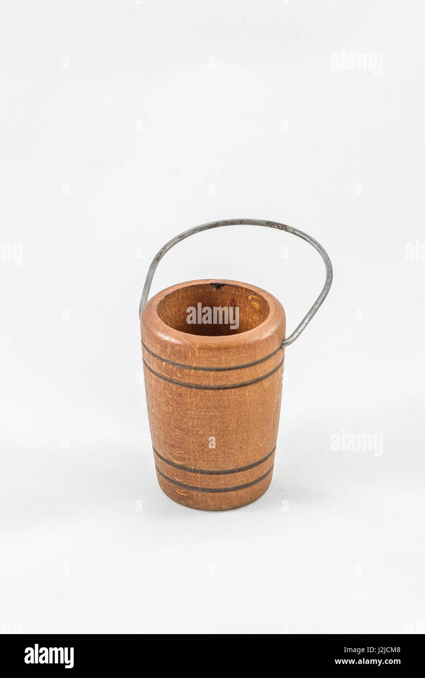 a miniature wooden bucket with metal handle Stock Photo Alamy