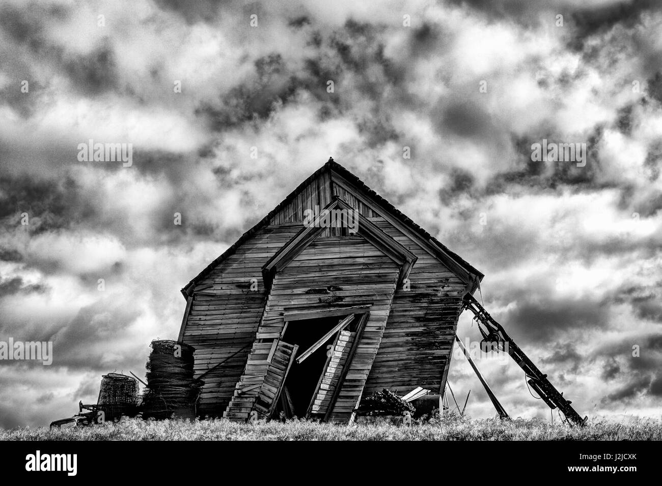 USA, Washington. Abandoned leaning schoolhouse in Palouse farm country. Credit as: Dennis Flaherty / Jaynes Gallery / DanitaDelimont.com Stock Photo