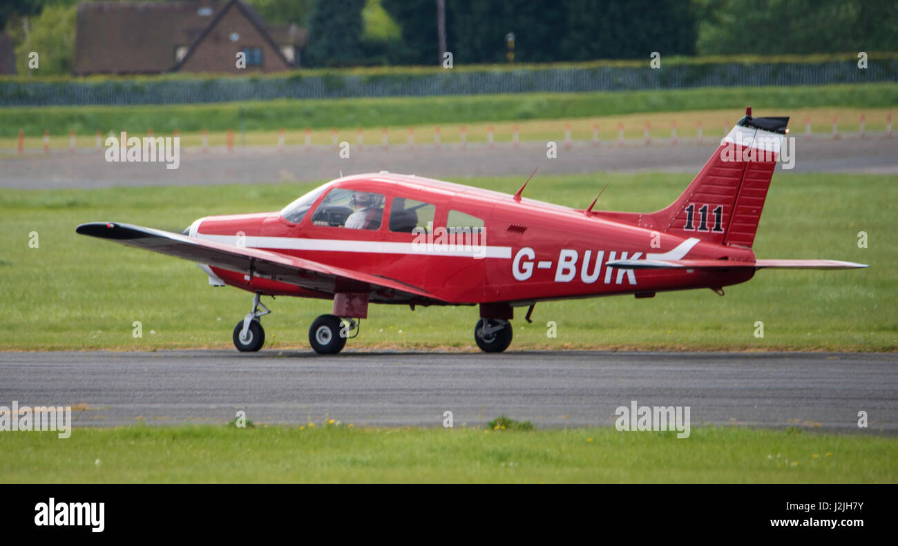 Piper PA-28-161 G-BUIL takes off from Northh Weald airfield Stock Photo