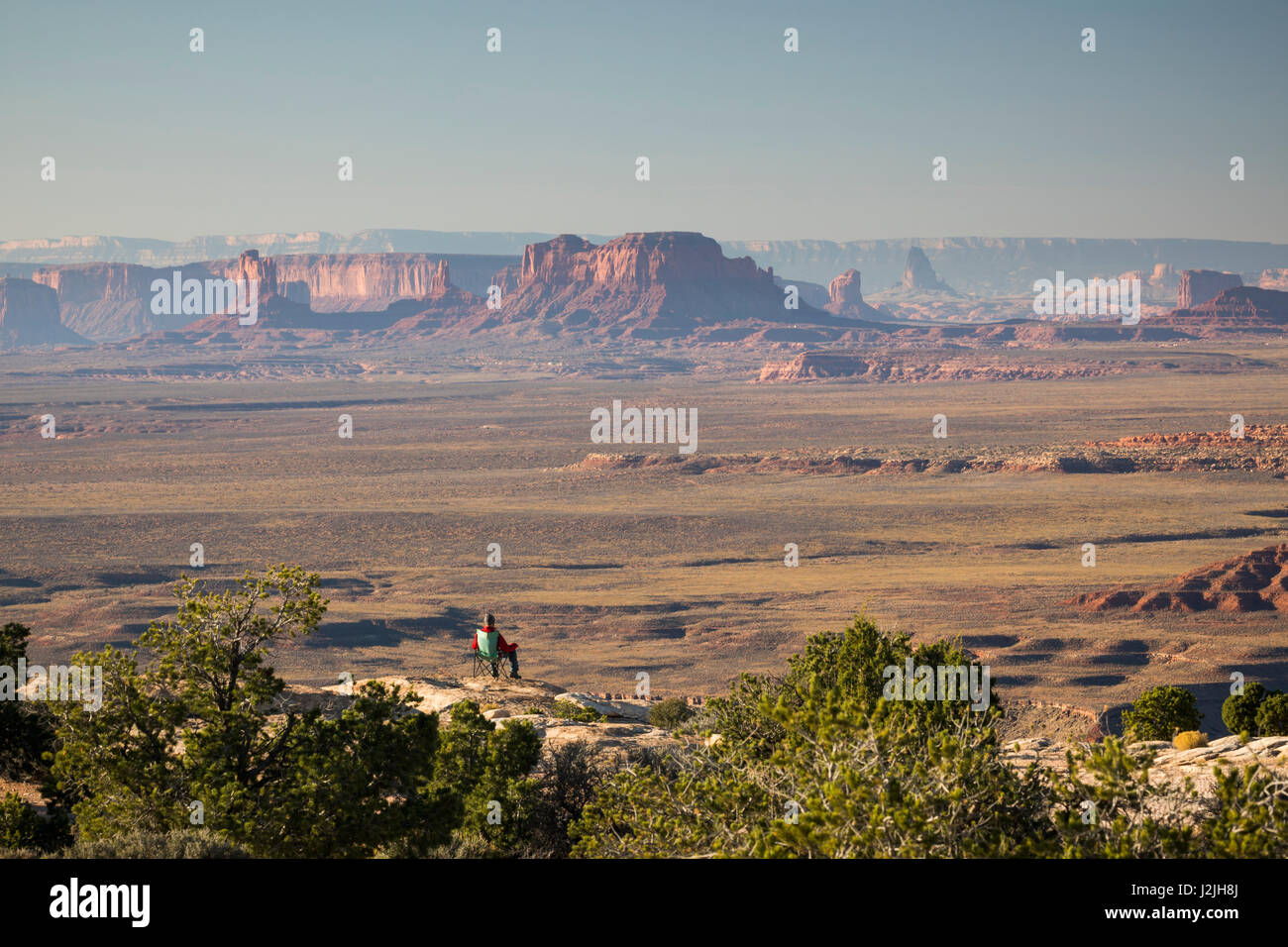 Whit Richardson enjoying the view from Muley Point, Utah. View from the edge of Bears Ears National Monument. Stock Photo