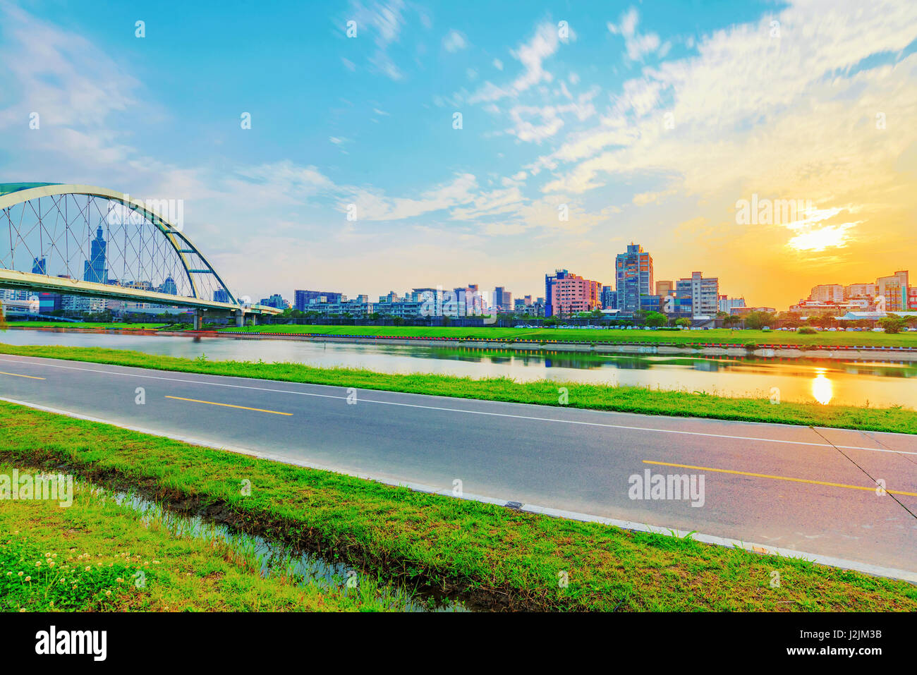 Riverside path with sunset in Taipei Stock Photo - Alamy