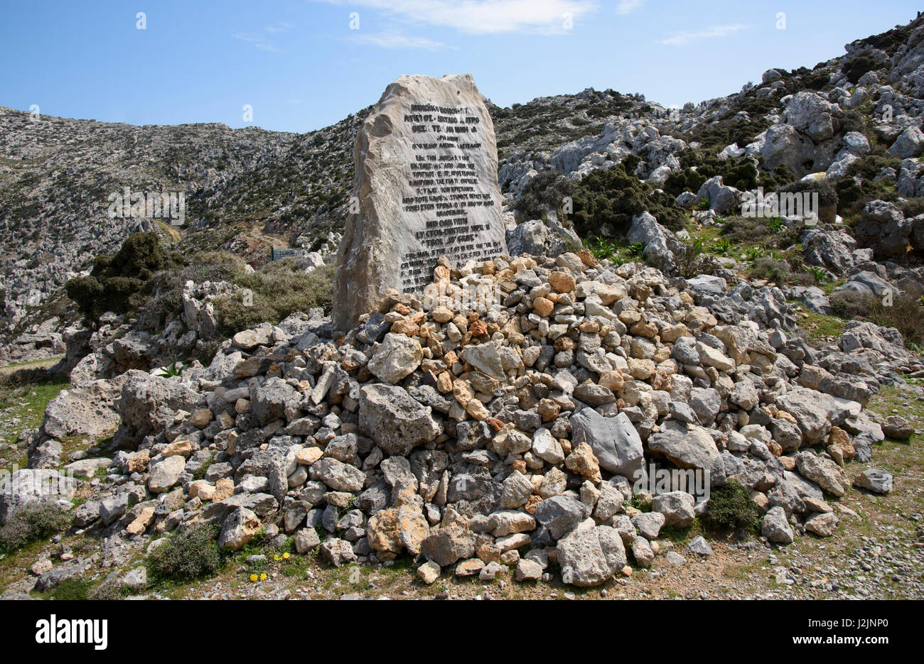 Tsoulis' Grave near Lasithi Plateau, Crete. A Turk executed by locals for his atrocities against Christians. Anyone passing adds their own rubble to t Stock Photo