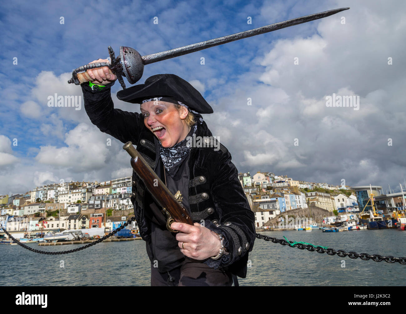Brixham, Devon, 29th Apr 17 Pirate Queen shows her swashbuckling stuff at the 8th Brixham Pirate Festival, one of the worlds biggest gatherings of 'Infamous pirates and lowly scallywags'. The festival runs until Bank Holiday Monday. Credit: South West Photos / Alamy Live News. Stock Photo