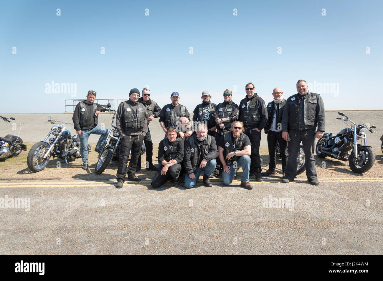 Aldeburgh Suffolk UK, 29th April 2017. Motorcyclists from the Chopper Club Germany pose on the seafront in bright sunshine  and temperatures of 13 degrees centigrade during a Bank Holiday Weekend trip to the East Coast. The club of custom motorbike enthusiasts raises money for children's charities. Credit Julian Eales/Alamy Live News Stock Photo