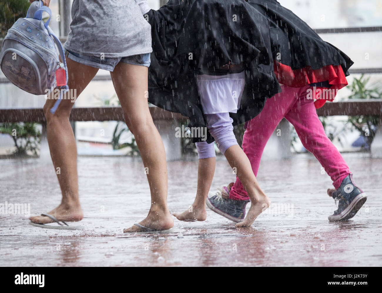 Las Palmas, Gran Canaria, Canary Islands, Spain 29th April, 2017. Weather: A mass exodus from the city beach in Las Palmas as torrential rain falls on the city at midday on Saturday. Credit: ALAN DAWSON/Alamy Live News Stock Photo