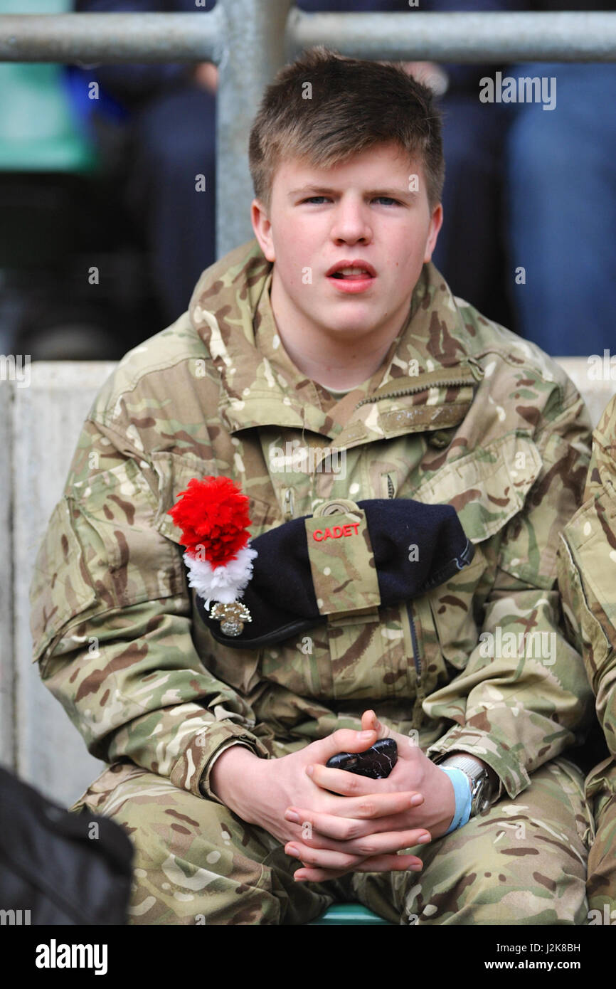 London, UK. 29th Apr, 2017. An Army Cadet watching the 100th annual Army Navy Rugby Match, Twickenham Stadium, London, UK.  The match is the annual rugby union match played between the senior XV teams of the Royal Navy and British Army and marks the culmination of the annual Inter-Services Competition. Credit: Michael Preston/Alamy Live News Stock Photo