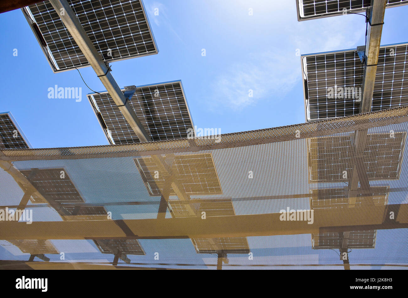 Many solar panels on roof with sky Stock Photo