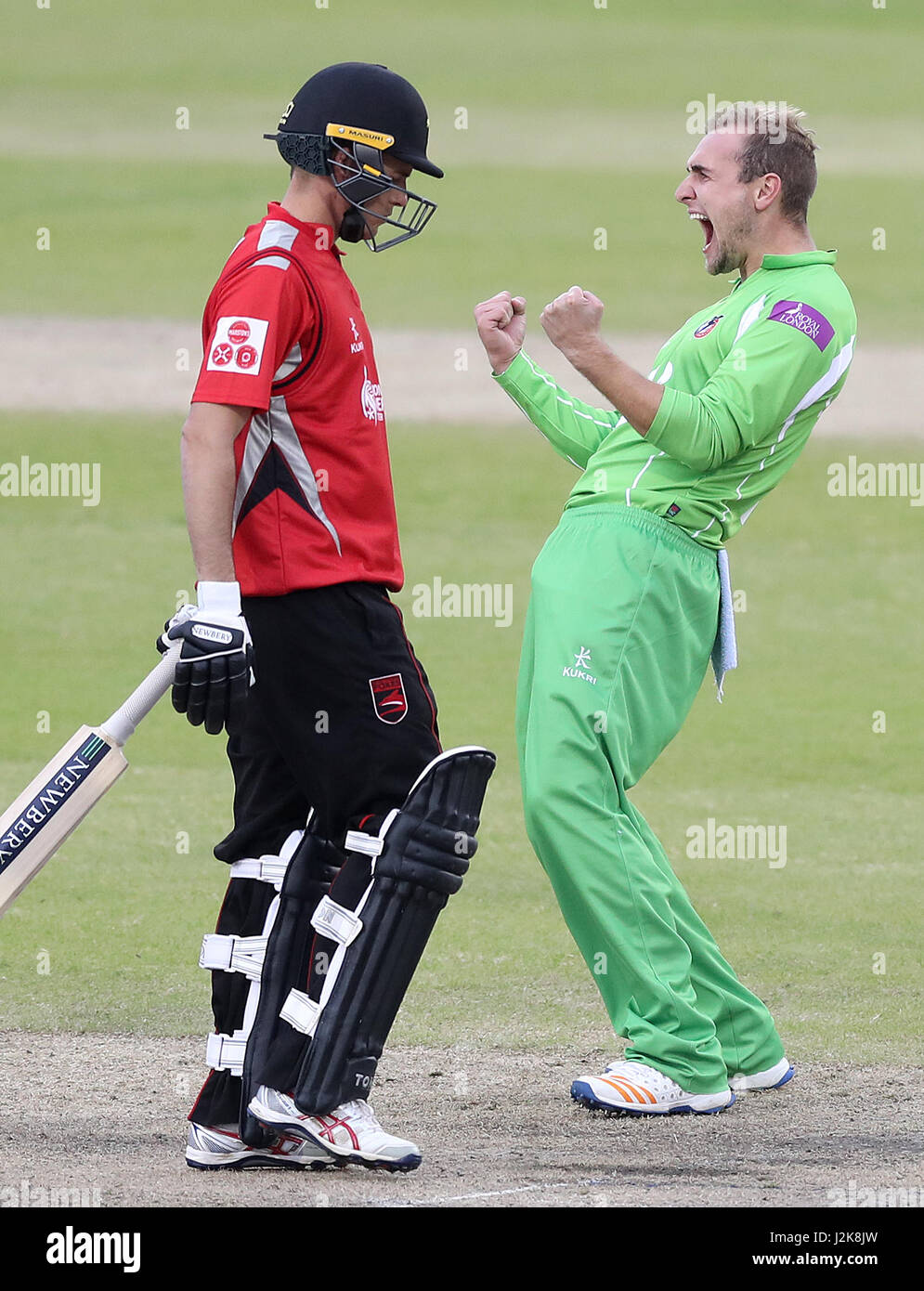 Lancashire's Liam Livingstone celebrates taking the wicket of Leicestershire's Neil Dexter (left), during the Royal London One Day Cup match at Old Trafford, Manchester. Stock Photo