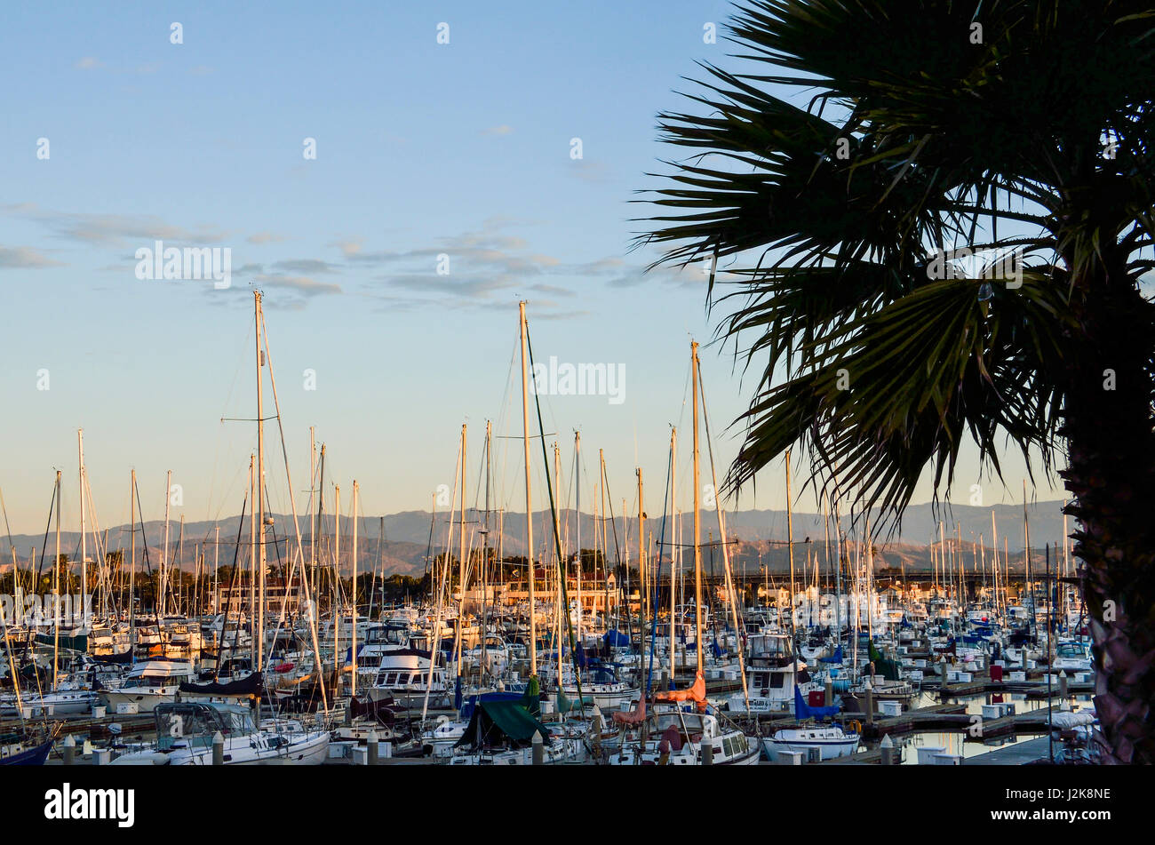 Many boats on marina during sunrise in Oxnard, California Stock Photo