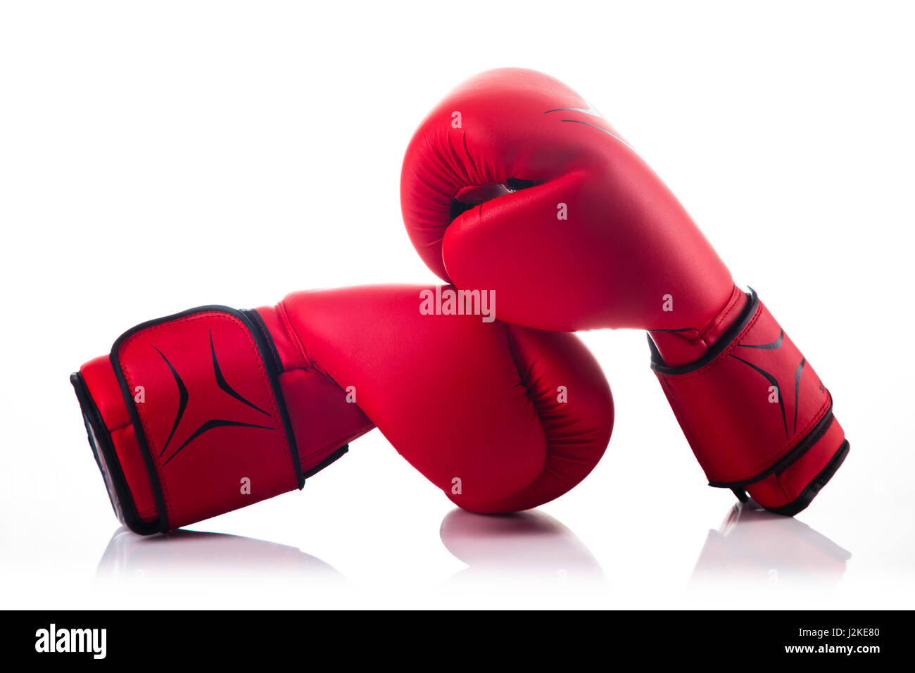 red boxing head guard and a pair of red boxing gloves Stock Photo Alamy