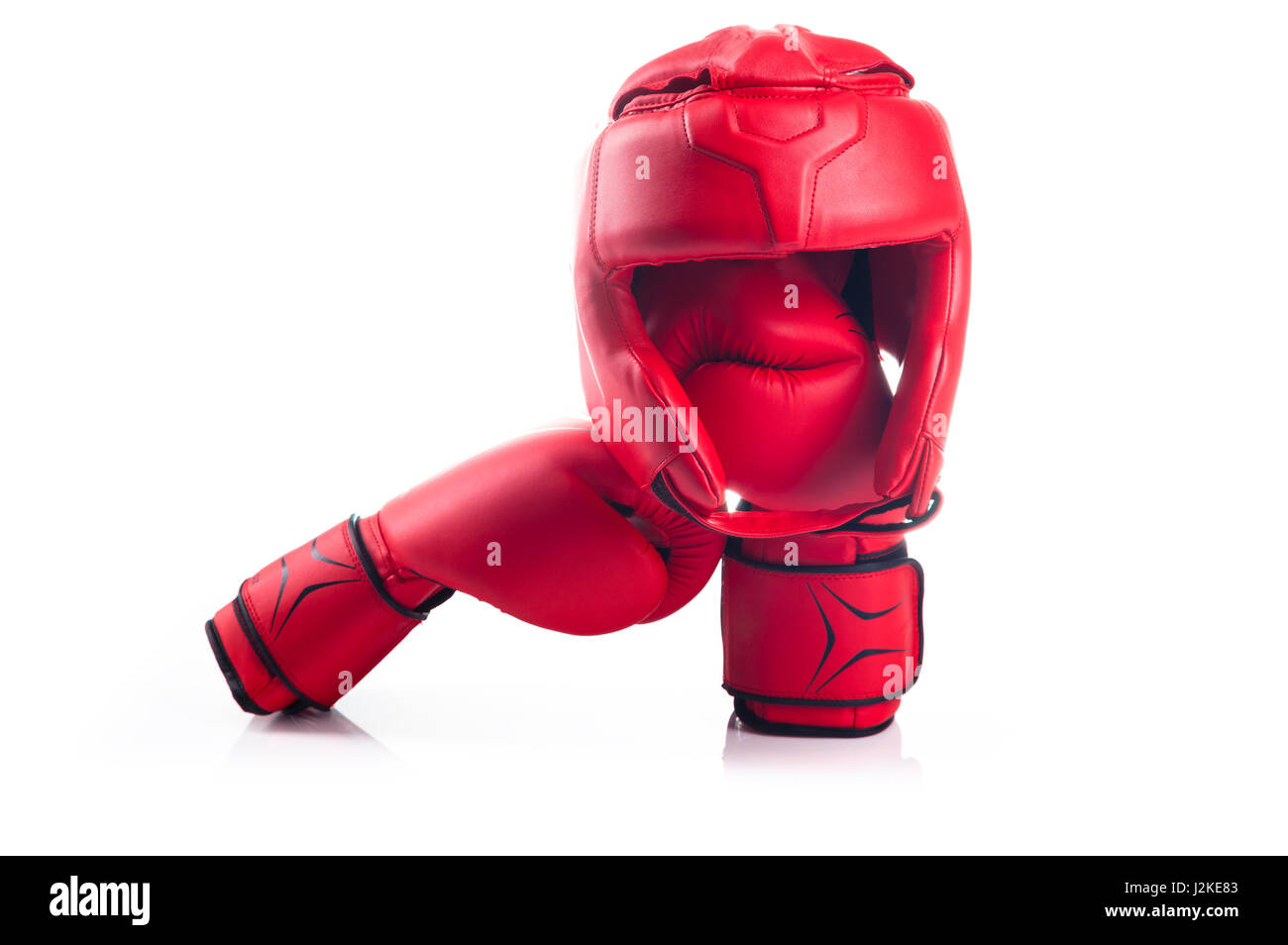 red boxing head guard and a pair of red boxing gloves Stock Photo Alamy
