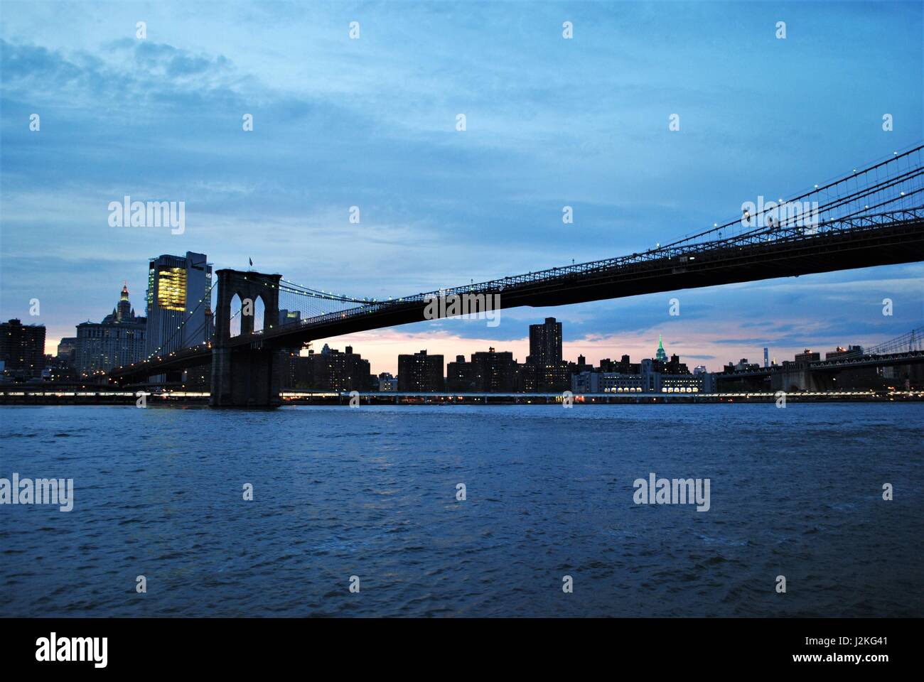 The Lower Manhattan sunset view from the East River Stock Photo - Alamy