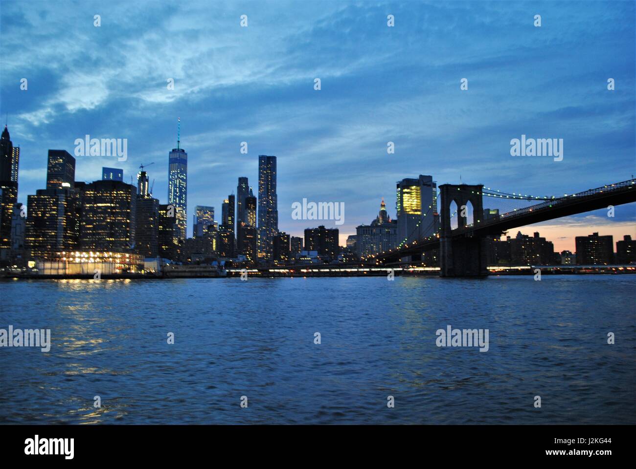 The Lower Manhattan sunset view from the East River Stock Photo - Alamy