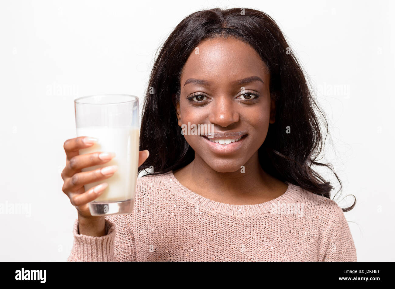 African girl drinking glass milk hi-res stock photography and images - Alamy