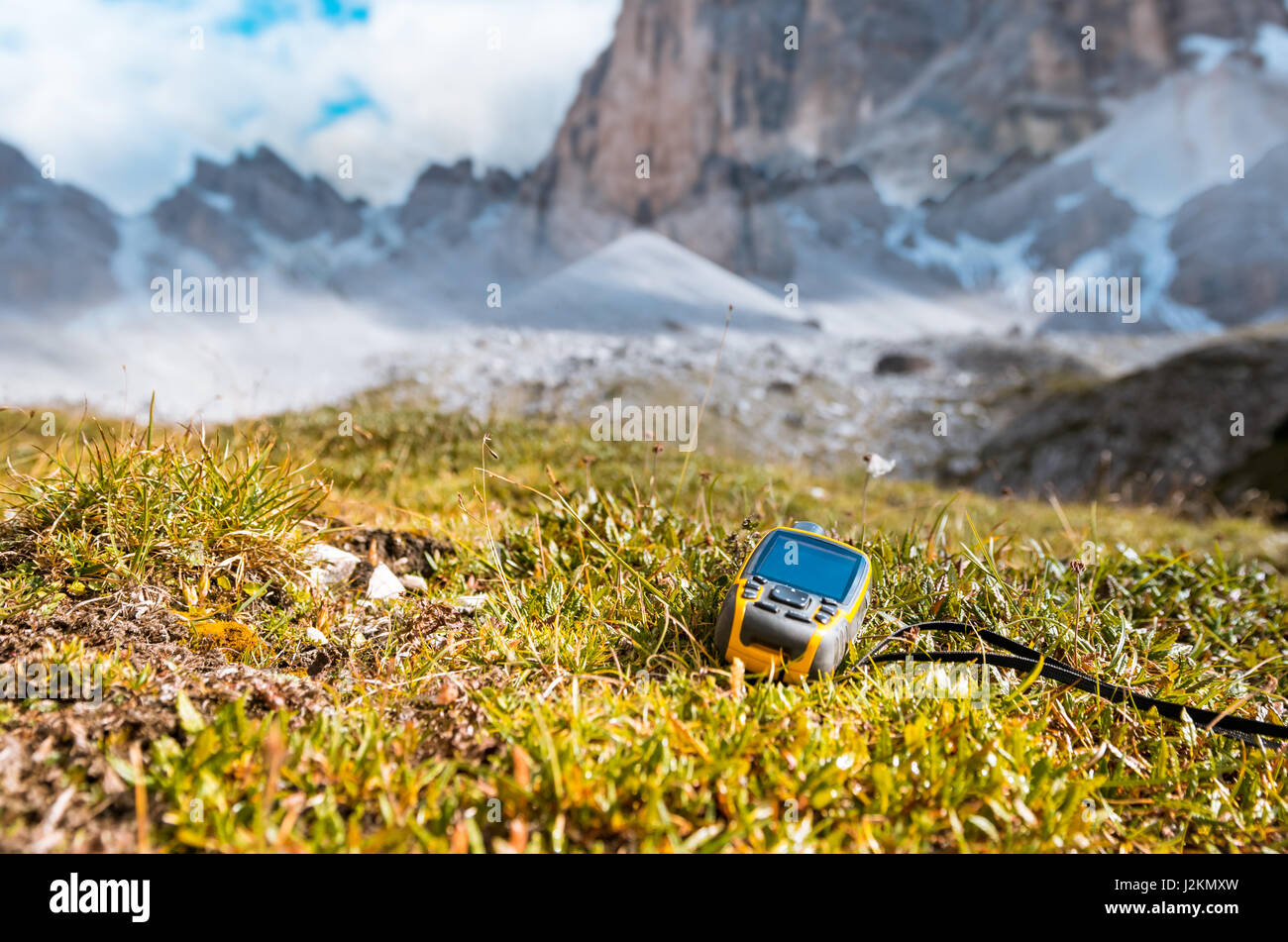 GPS navigator in hand Dolomites Alps Stock Photo